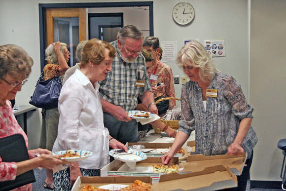 Joy Shearman, Evelyn Partridge, and Bill Moor being served by Barbara Bradford Eschbach