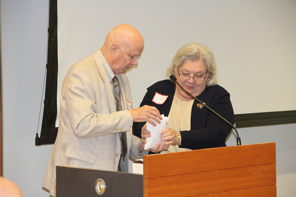 Jim Fordemwalt and Jo Madonna with volunteer appreication envelopes